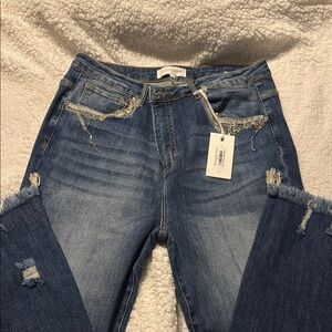 Classic Blue Straight Leg Jeans with Distressed Details